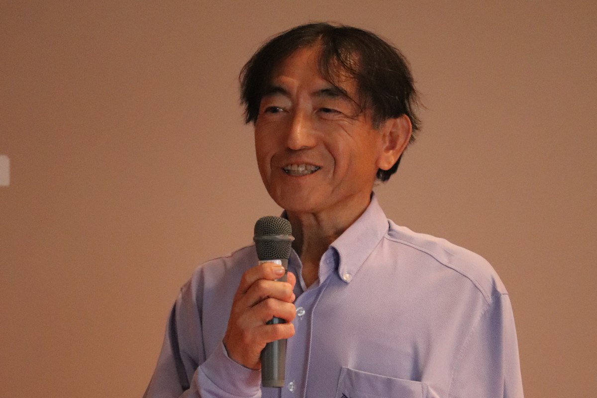 開会のあいさつをする平井清文 実行委員長